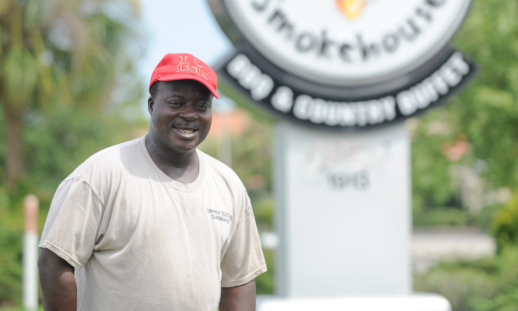Mr. Isaac Collington JR. in front of Simply Southern Smokehouse