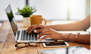 Woman Using Her Computer To Access Online Banking